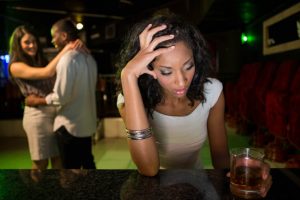 unhappy-woman-sitting-bar-counter-couple-dancing-her-bar_107420-14527-1-300x200.jpg